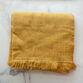 ochre-tablecloth2_635340e4-5976-4a8f-9b10-51b6f3d3f20d